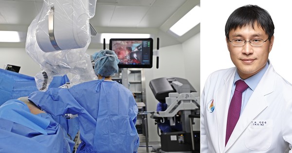12월 22일 인하대병원 로봇수술센터에서 외과 이진욱 교수(사진 오른쪽 끝)가 다빈치 로봇 콘솔에 앉아 단일공 로봇 갑상샘암 수술(SPRA)을 집도하고 있다. / 인하대병원 외과 이진욱 교수
